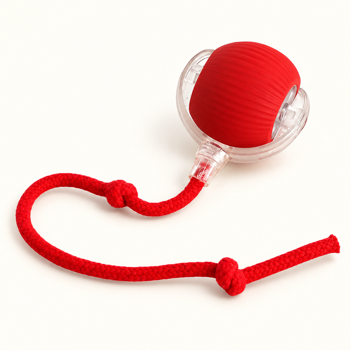 Pelota interactiva roja con carcasa transparente y cuerda; recreación ilustrativa